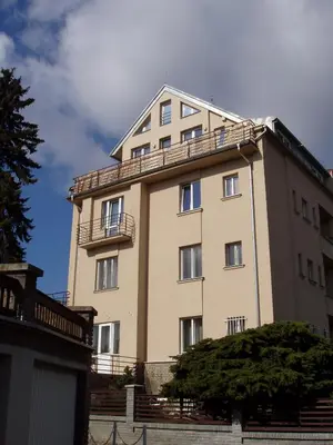a large building with balconies on the side of it at Vila Malvazinky in Prague