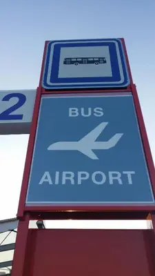 a bus airport sign on the side of a building at Cozy room at metro station, private bathroom, 9minutes oldtown, 15minutes airport, WiFi in Prague