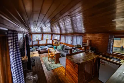 an aerial view of a living room in a house at Prague Bay Houseboats in Prague