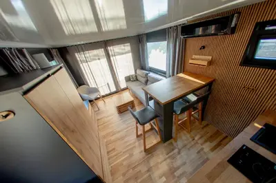 an overhead view of a room with a table and chairs at Prague Bay Houseboats in Prague
