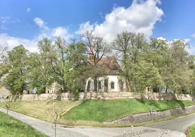 an old house on top of a hill at Apartmány č.p. 9 in Kouřim