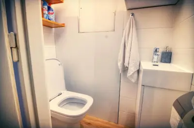 a small bathroom with a toilet and a sink at Apartment Anna Vysehrad in Prague
