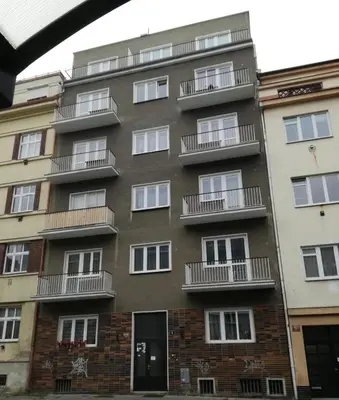 an apartment building with balconies on the side of it at Apartment Anna Vysehrad in Prague