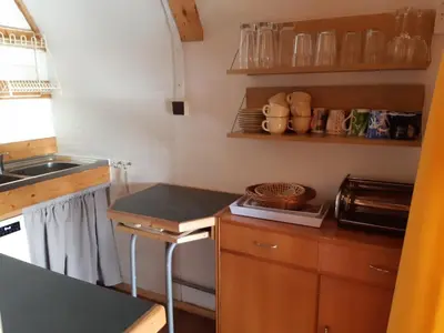 a small kitchen with a counter and a sink at Holiday home Zajícovi in Rabyně
