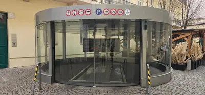 a building with glass doors on a street at Old Town Home Prague in Prague