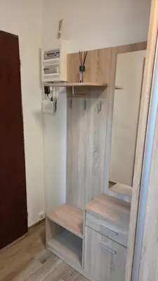 a dressing room with a mirror and a dresser at Apartmán Mírová 472 B in Milovice