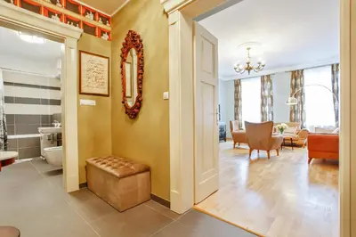 a hallway of a home with a living room at Newly opened, designer OPERA Apartment in Prague
