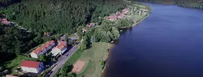 an aerial view of a house next to a body of water at Apartmá u Hovorků in Županovice
