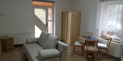 a living room with a couch and a table at Ubytování Na Vyhlídce 143 in Benátky nad Jizerou