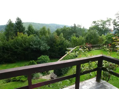a view of a garden from the deck of a house at Villa Blanka in Horní Podkozí