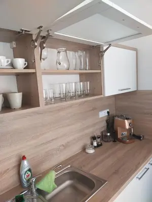 a kitchen with a sink and a counter top at Apartmán Karolína in Poděbrady