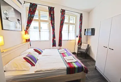 a bedroom with a bed and a window at Historic Centre Residence in Prague