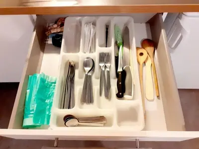 a drawer filled with utensils and utensils at Magnificent apartment in the center of Prague in Prague