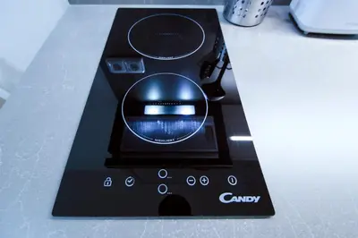 a close up of a remote control on a counter at Modern apartment Pricna 4 in Prague