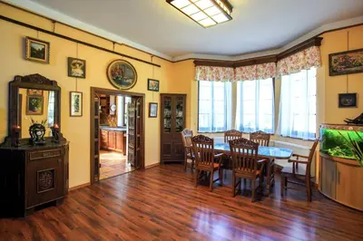 a dining room with a table and chairs at Penzion Kersko in Hradišťko