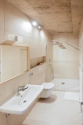 a bathroom with a sink and a toilet at Exclusive penzion Viva Residence in Mladá Boleslav