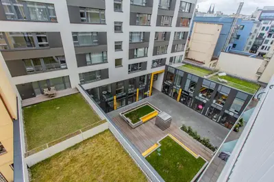 an aerial view of the courtyard of a apartment building at Spacious Terrace Apartment with free private parking in Prague