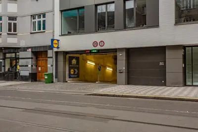 a building with a door on the side of a street at Spacious Terrace Apartment with free private parking in Prague