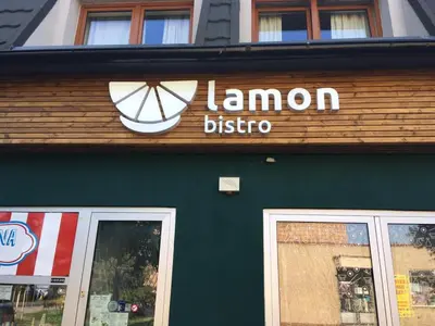 a sign on the side of a store at BAILANDO Studio in Neratovice