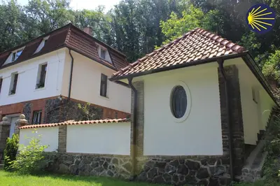 a small building with a window and a roof at Domek Praha - Zbraslav, u zámku in Prague