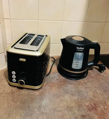 a toaster and a coffee maker on a counter at Charming Old Town Retreat in Prague