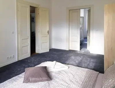 a bedroom with a bed with a pillow on it at VIP city CENTER apartment Prague in Prague
