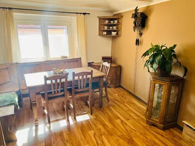 a dining room with a table and chairs at Penzion Na Růžku in Sedlčany