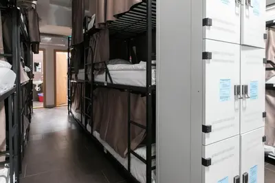 a row of bunk beds in a hospital room at Hostel Mandarinka in Prague