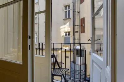 a view of a balcony from a door at BRIGHT Prague Havelská in Prague