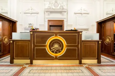 a courtroom with a wooden podium in a building at Seven days Smíchov in Prague