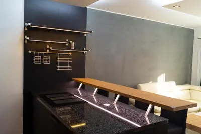 a bathroom with a bench in a room at Krejcarek Garden Apartment in Prague