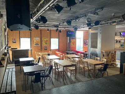 a restaurant with tables and chairs in a room at KuK Račice in Račice