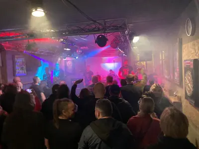 a crowd of people dancing in a club at KuK Račice in Račice