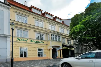a building with a hotel margarita on a street at Hotel Magnolia in Roudnice nad Labem