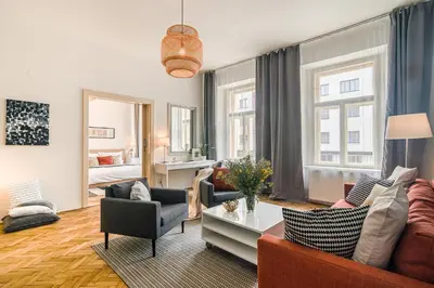 a living room with a couch and a table at APT in center Prague by Michal&Friends in Prague
