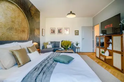 a bedroom with a large white bed in a room at APT IN CENTER Prague Great view by Michal&Friends in Prague