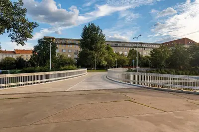 an empty road in front of a large building at APT IN CENTER Prague Great view by Michal&Friends in Prague