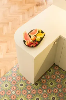 a plate of fruit on top of a counter at Downtown Designer apartment Karlin in Prague