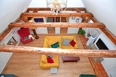 an overhead view of a living room with colorful furniture at Romantic apartment under the Prague castle in Prague