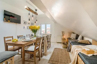 a dining room with a table and chairs at APTs in OLD TOWN PRAGUE by Michal&Friends in Prague