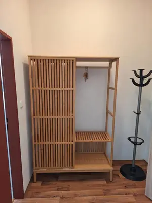 a book shelf in a room with a spider on it at Penzion Koupaliště in Litoměřice