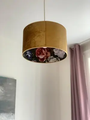 a brown lamp with flowers on it in a room at Palace Dlazdena Central Apartment - New Town in Prague