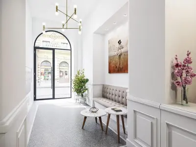 a hallway with a bench and a window at Palace Dlazdena Central Apartment - New Town in Prague