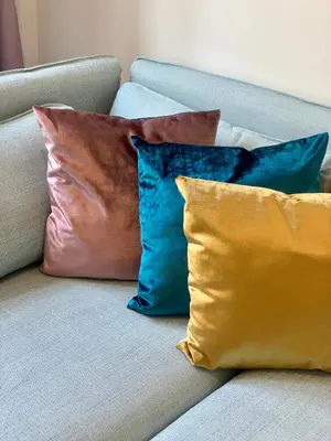 a group of pillows sitting on a couch at Palace Dlazdena Central Apartment - New Town in Prague