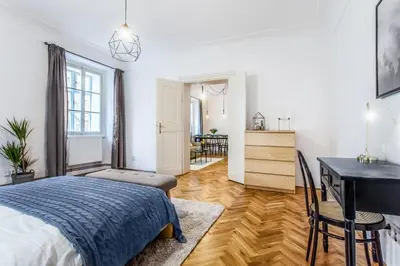 a bedroom with a bed and a desk and a piano at Old Town 2 BDR apartment, free coffee in Prague