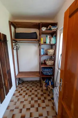 a room with a closet with a tiled floor at Holiday Home Jestřebice 8 by Interhome in Dobřeň
