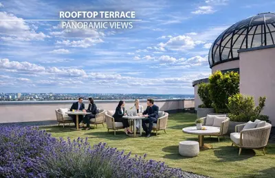 a group of people sitting at tables on a roof at Don Giovanni Hotel Prague - Great Hotels of The World in Prague