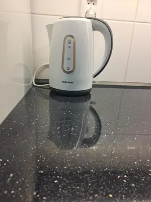 a coffee maker sitting on top of a counter at apartment golden Prague in Prague