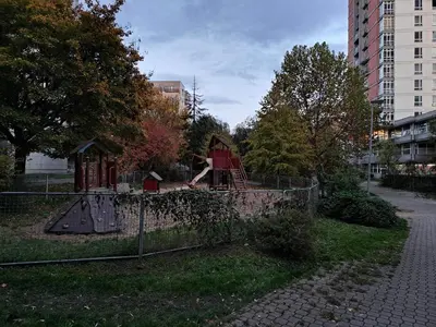 a park with a playground in a city at apartment golden Prague in Prague