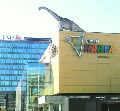 a building with a dinosaur on the side of it at soukromý pokoj in Prague